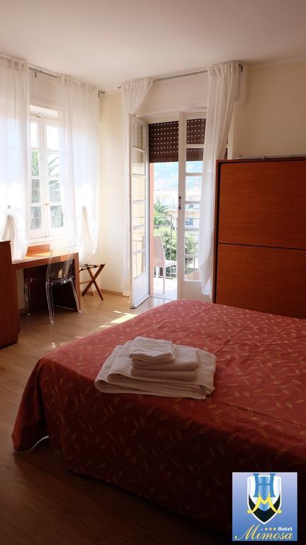 Hotel Mimosa Споторно Екстер'єр фото